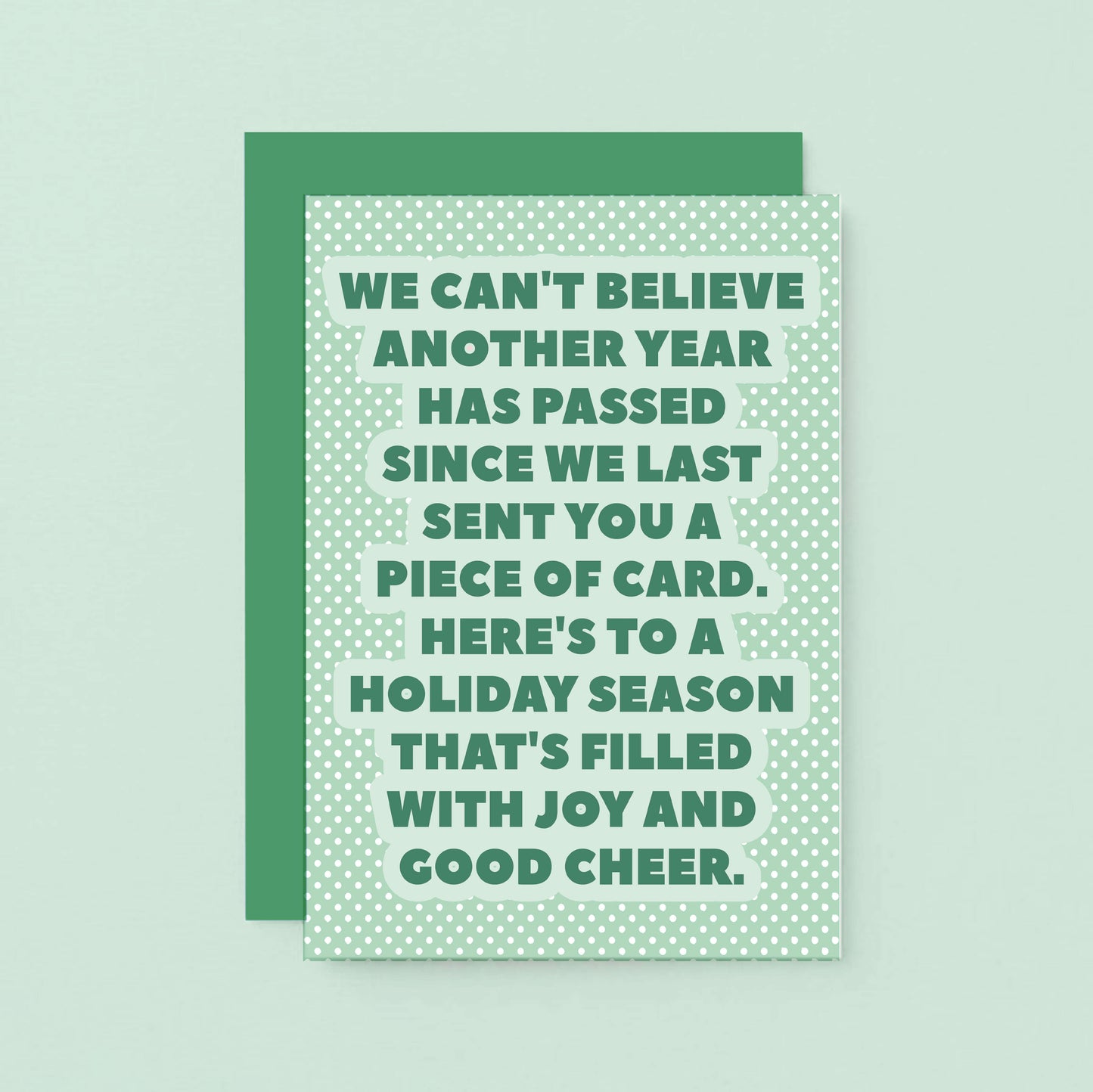 Christmas Card by SixElevenCreations. Reads We can't believe another year has passed since we last sent you a piece of card. Here's to a holiday season that's filled with joy and good cheer. Product Code SEC0077A6