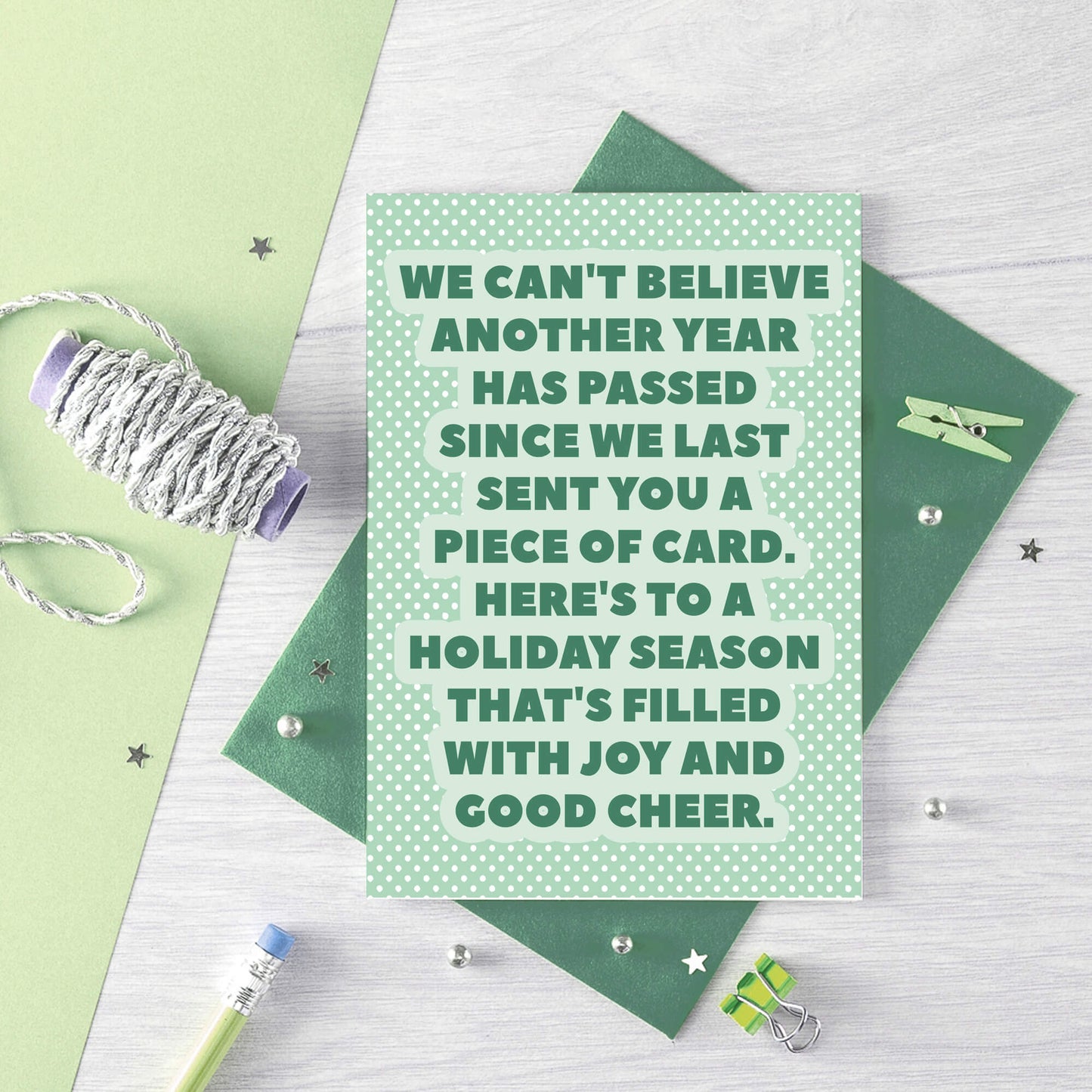 Christmas Card by SixElevenCreations. Reads We can't believe another year has passed since we last sent you a piece of card. Here's to a holiday season that's filled with joy and good cheer. Product Code SEC0077A6