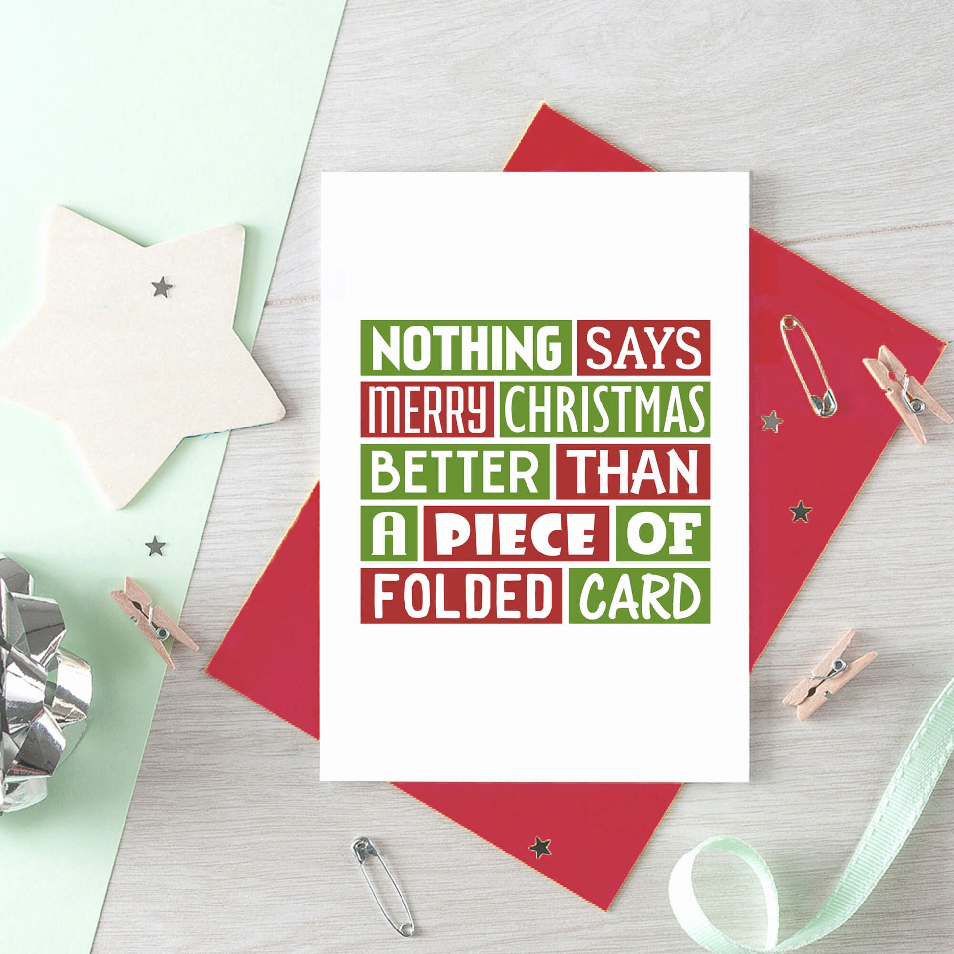 Christmas Card by SixElevenCreations. Reads Nothing says Merry Christmas better than a piece of folded card. Product Code SEC0017A6