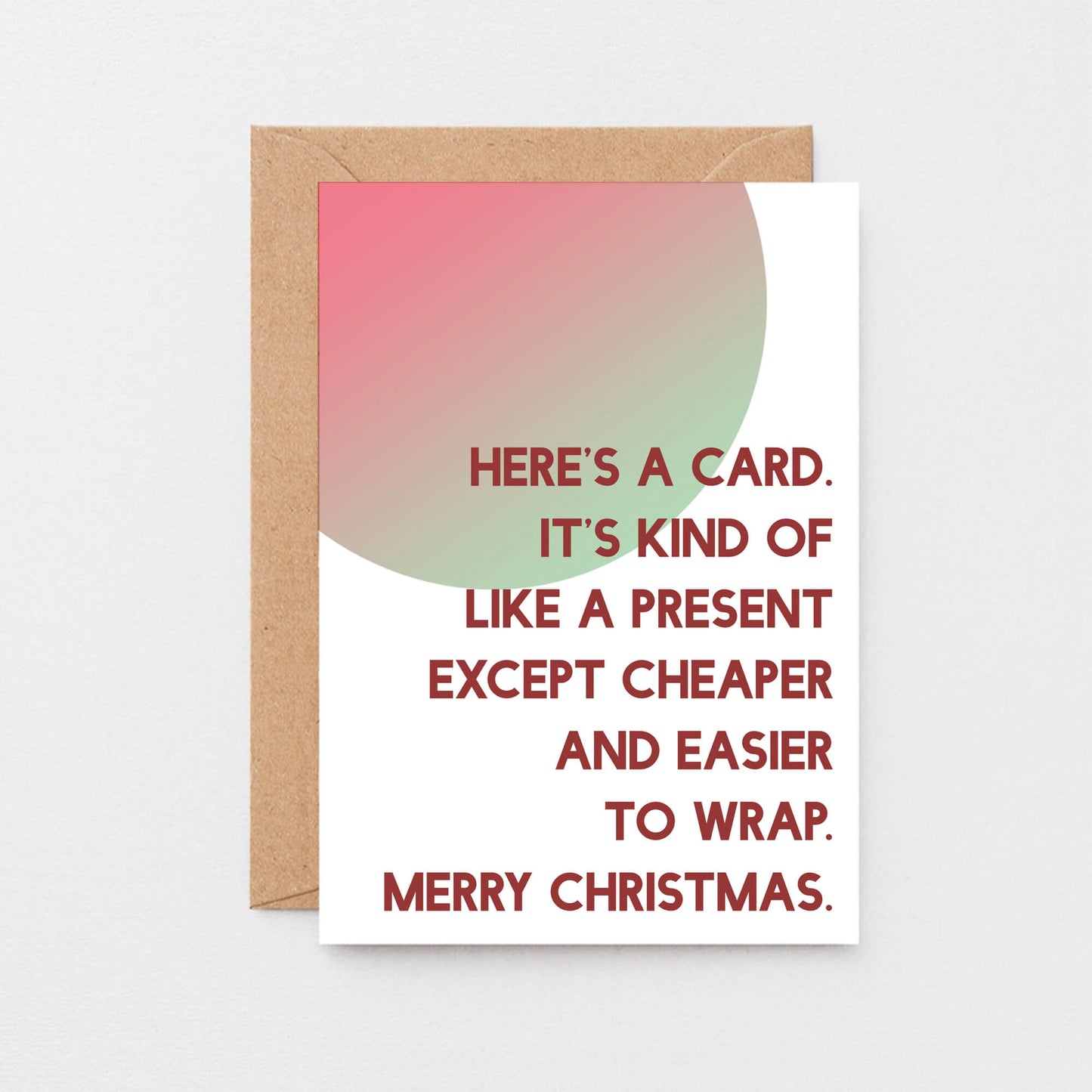 Christmas Card by SixElevenCreations. Reads Here's a card. It's kind of like a present except cheaper and easier to wrap. Merry Christmas. Product Code SEC0041A6