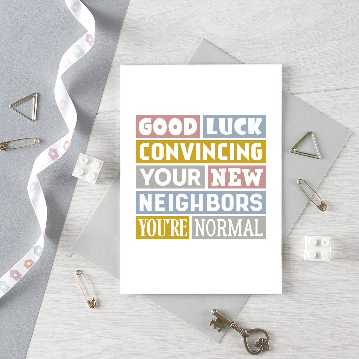 New House Card by SixElevenCreations. Reads Good luck convincing your new neighbors you're normal. Product Code SE0105A6_US