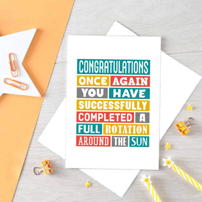 Birthday Card by SixElevenCreations. Reads Congratulations Once again you have successfully completed a full rotation around the sun. Product Code SE0050A5