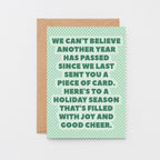 Christmas Card by SixElevenCreations. Reads We can't believe another year has passed since we last sent you a piece of card. Here's to a holiday season that's filled with joy and good cheer. Product Code SEC0077A6