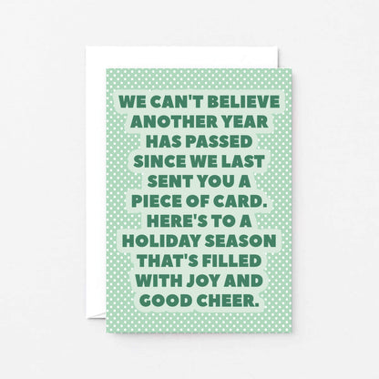 Christmas Card by SixElevenCreations. Reads We can't believe another year has passed since we last sent you a piece of card. Here's to a holiday season that's filled with joy and good cheer. Product Code SEC0077A6