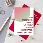 Christmas Card by SixElevenCreations. Reads You pretending to like my family is much appreciated. Merry Christmas. Product Code SEC0045A6