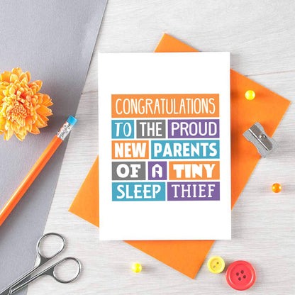 New Baby Card by SixElevenCreations. Reads Congratulations to the proud new parents of a tiny sleep thief. Product code SE0019A6